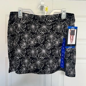 NWT Stretchy Skort. Super Cute! Black with white designs